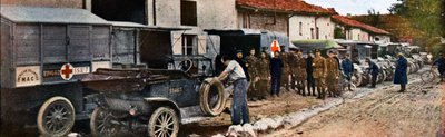 The U.S. Post Office and Ambulance Trucks with the Red Cross in Dieue-sur-Meuse North of Verdun, September 1916 by Jules Gervais Courtellemont